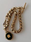 An early 20th century fancy single Albert link gold chain, 38 cm, fitted to two swivel clasps, T-