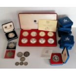 A 1977 Silver Jubilee Crown presentation set by Spink & Son, comprising eight silver proof crowns;