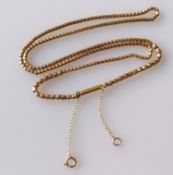 A 9ct yellow gold serpentine chain necklace with bayonet clasp, stamped, 40 cm, 6.10g