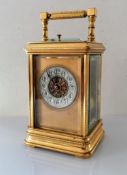 A larger 19th century French gilt brass repeating carriage clock, silvered chapter ring with