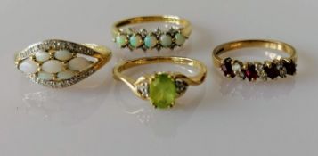 Four gem-set rings in yellow gold settings, all hallmarked 9ct, sizes P, P, O, M 1/2, 8.20g (4)