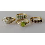 Four gem-set rings in yellow gold settings, all hallmarked 9ct, sizes P, P, O, M 1/2, 8.20g (4)