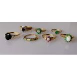 An assortment of seven 9ct gold gem-set rings, various sizes, all hallmarked, 11.88g