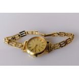 A 9ct gold-cased mid-century Favre-Leuba quartz ladies dress watch with champagne dial, baton