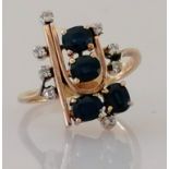 A mid-century sapphire and diamond cocktail ring on a white and yellow gold setting, size N, stamped