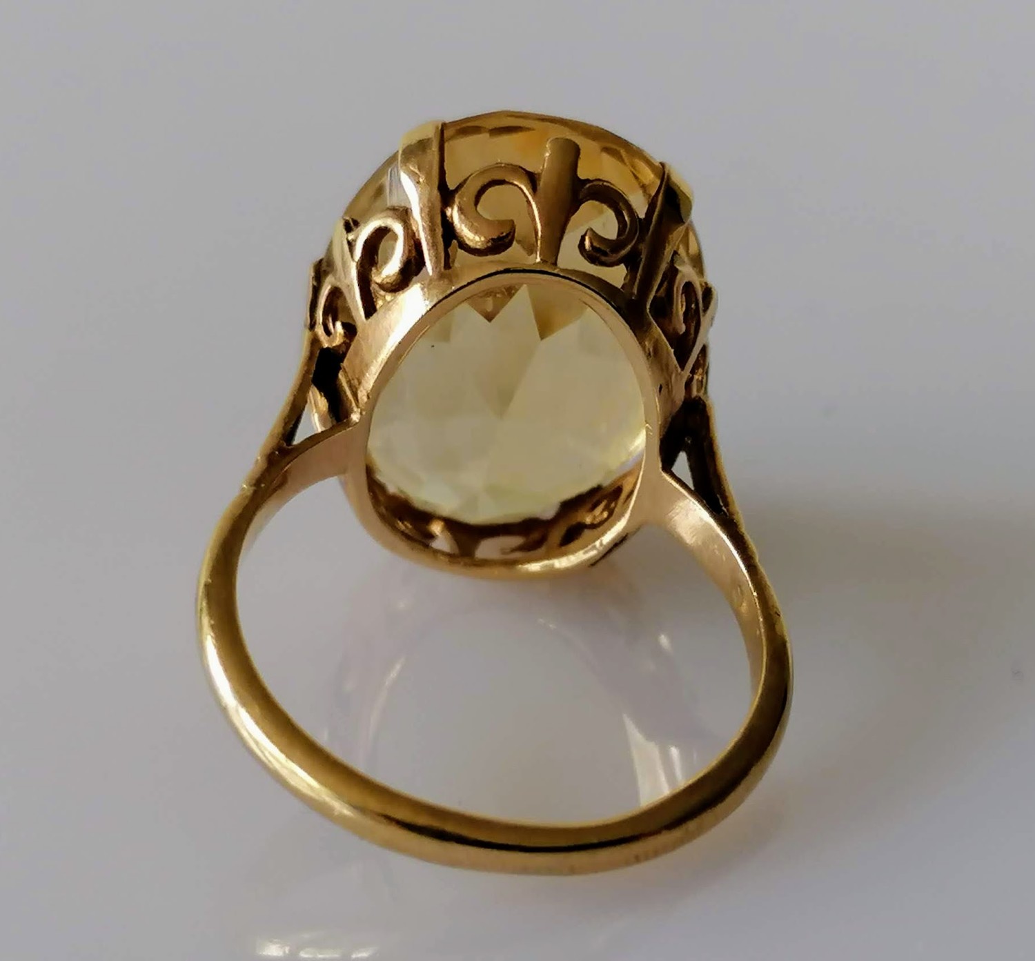 An oval faceted citrine dress ring on a gold basket setting, 20mm x 15mm, stamped 9ct, size P, 6.57g - Image 3 of 3