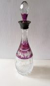 A silver mounted cut glass decanter and stopper with hobnail and etched ruby glass decoration by C J