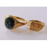 Two 9ct yellow gold signet rings, one with a carved oval onyx, the other initialled, sizes S, H,