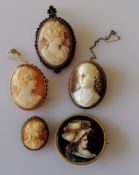 A silver gilt oval cameo shell brooch with garnet decoration, 55 x 35mm; two others with 9ct