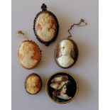 A silver gilt oval cameo shell brooch with garnet decoration, 55 x 35mm; two others with 9ct