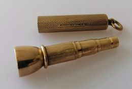 A George V gold cigar piercer of tubular form with engine turned decoration by Sampson Mordan,