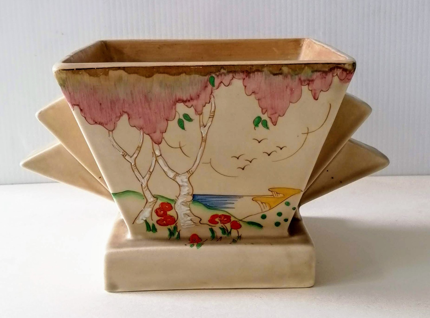 An Art Deco Clarice Cliff for Wilkinson Taormina pattern vase with stylized handles, hand-painted in