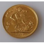 A gold full-sovereign, 1958