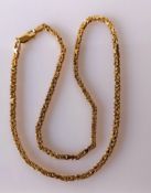 A 9ct yellow gold Byzantine neck chain with lobster clasp, import marks, 38 cm, 14g