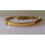 An Italian 18ct yellow gold flat curb-link identity bracelet, 19 cm, stamped 750, 57.5g