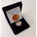 A Royal Mint cased proof gold half sovereign, dated 1982