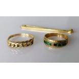 Two 9ct gold rings, (stone missing from one), sizes Q, N, both hallmarked and a tie pin, stamped