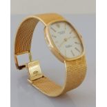 A Rolex Geneve Cellini ladies wristwatch, the signed brushed gold dial and bark effect bracelet,