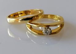 A mid-century solitaire diamond ring on a yellow gold split shank, diamond 0.10 carats, size L,