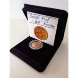 A Royal Mint cased proof gold half sovereign, dated 1982