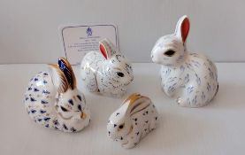 A Royal Crown Derby Bunny MMIV, Snowy Rabbit 21st Year Edition with CoA, both with gold buttons;