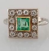 An Art Deco-style white gold platform ring with square-cut emerald, 5mm, surrounded by twelve