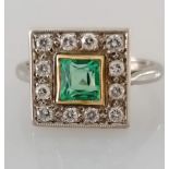 An Art Deco-style white gold platform ring with square-cut emerald, 5mm, surrounded by twelve