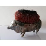 An Edwardian silver nib brush in the form of a pig, Birmingham, 1906, maker's mark rubbed, 11 cm