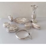 An assortment of four late Victorian Birmingham silver ring or pill boxes, (one other, plain, not
