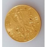 A 1928 Austrian 25 schilling gold coin, 5.89g