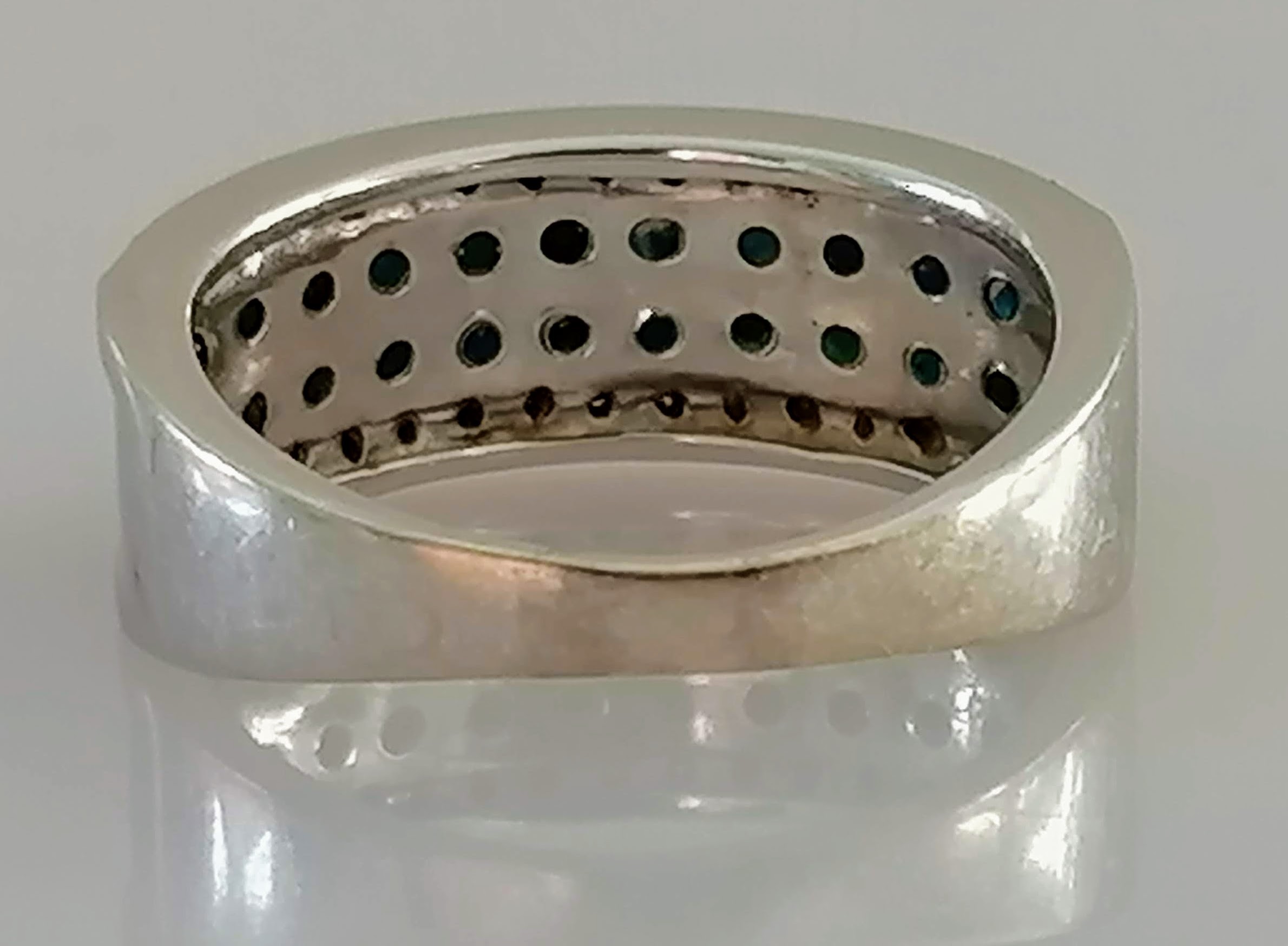 An 18ct white gold half-hoop eternity ring with pave-set white and black diamonds, size N1/2, - Image 3 of 4