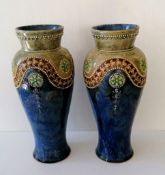 A matching pair of Doulton Lambeth stoneware vases by Ethel Beard, 29 cm H, stamped to base, without