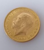 A George V gold half sovereign, 1913