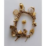 A gold charm bracelet, each link and charm hallmarked 9ct, 19 cm, 58.5g