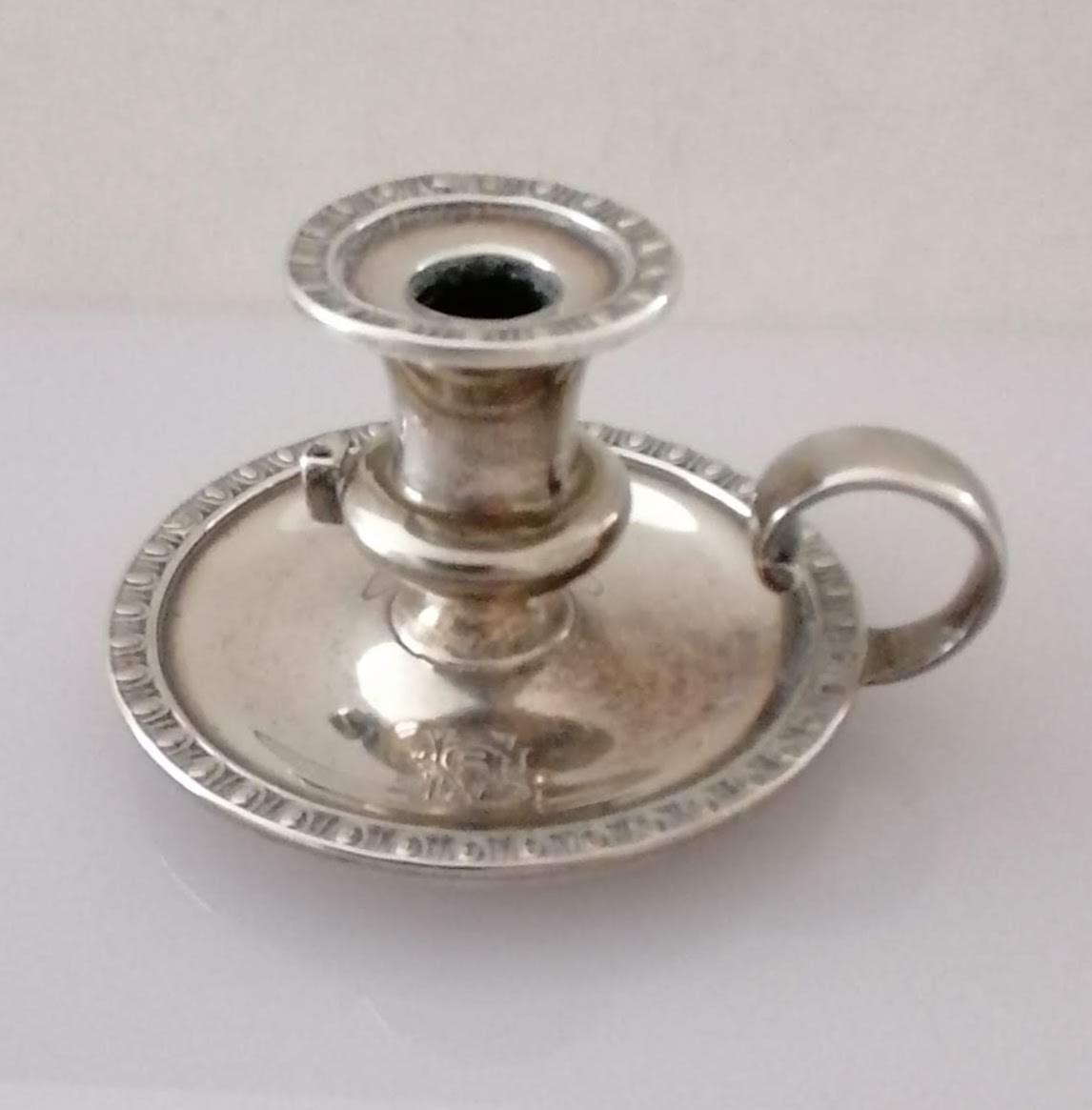 A Victorian silver chamberstick with egg and dart decoration, removable sconce, crested - Image 2 of 3