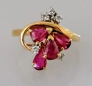 A ruby and diamond ring with pear and brilliant-cut stones on 9ct yellow gold, size L, hallmarked,