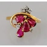 A ruby and diamond ring with pear and brilliant-cut stones on 9ct yellow gold, size L, hallmarked,