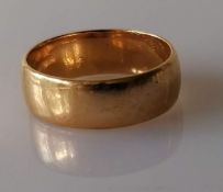 A yellow gold wedding band, 6mm, unmarked, tests for 18ct, size P, 6.27g
