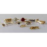 Seven gold gem-set rings, mixed sizes, one brooch and two pendants, all hallmarked 9ct, 19.32g (10)