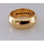 A 9ct yellow gold wedding band, size R, 8mm, hallmarked, 12.3g