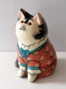 A Rye Pottery figure of a seated cat designed by Joan and David de Bethel, Rye, Sussex, signed and