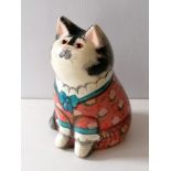 A Rye Pottery figure of a seated cat designed by Joan and David de Bethel, Rye, Sussex, signed and