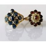 A sapphire and diamond cluster ring on yellow gold and a garnet and seed pearl flower ring, both