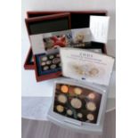 Four cased United Kingdom Executive Proof Coin Sets for 2001, '05, '06, '07, with CoA and original
