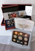 Four cased United Kingdom Executive Proof Coin Sets for 2001, '05, '06, '07, with CoA and original