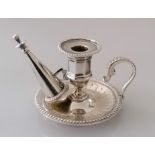 A Victorian silver smaller chamber candlestick with conforming snuffer with beaded decoration on a