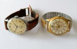 A 1950s Smiths wrist watch with two-tone dial, 29mm, Roman numerals, subsidiary seconds hand,