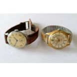 A 1950s Smiths wrist watch with two-tone dial, 29mm, Roman numerals, subsidiary seconds hand,