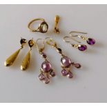 Two pairs of gold and amethyst earrings, another pair (one back missing) and a half and a gold ring,