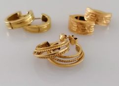 A pair of gold earrings with rope twist decoration, stamped 585, 4.2g and two other pair of